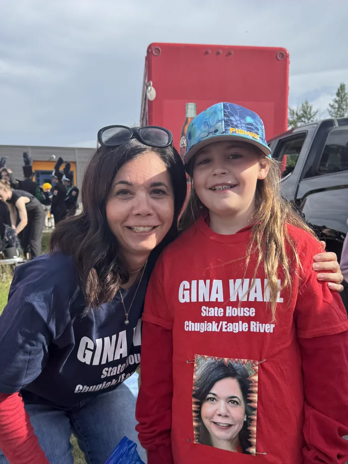 Gina Wall with a young supporter in campaign shirts