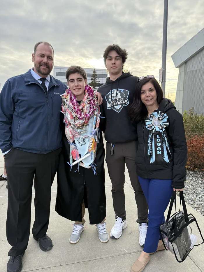 Gina and Doug Wall with their sons Jackson and Logan